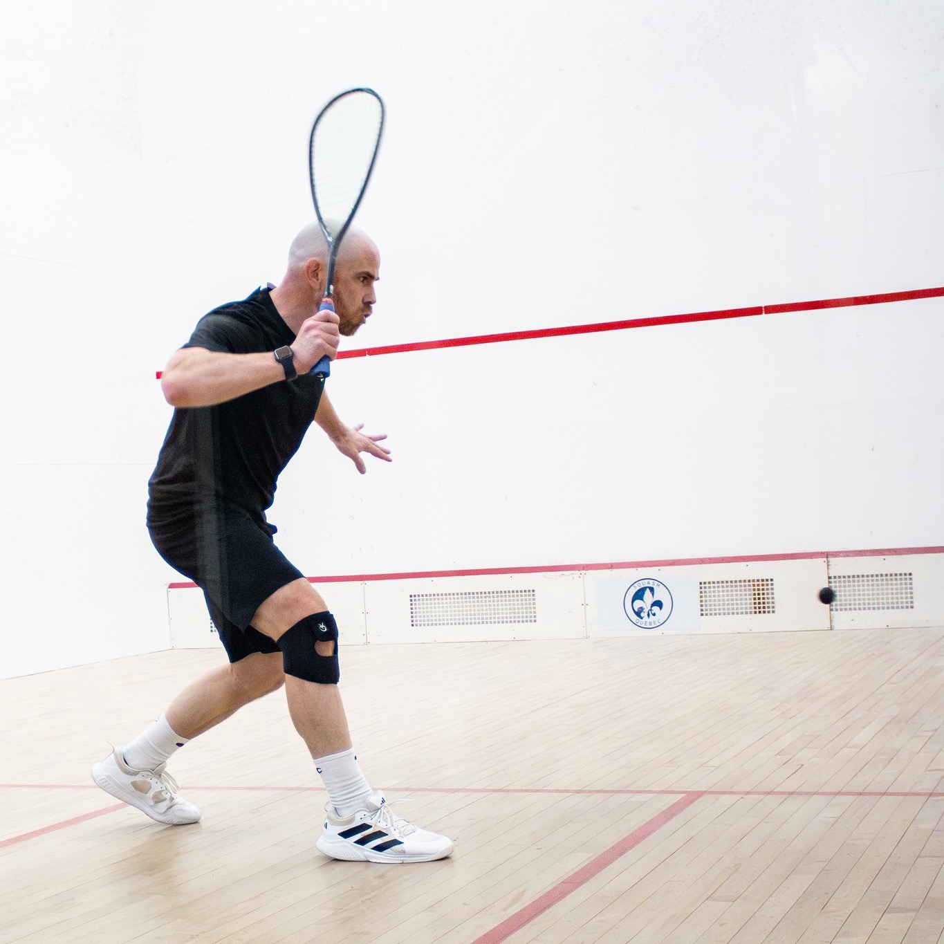 David MacVicar playing squash